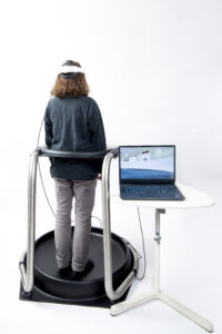 HVS 6D VR omnidirectional treadmill with participant during immersive Morris Water Maze navigation task
